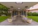 Building entrance with lush landscaping and mid-century modern design at 2201 N Central Ave # 4E, Phoenix, AZ 85004