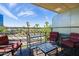 Private balcony offering city views and comfortable seating at 2201 N Central Ave # 4E, Phoenix, AZ 85004