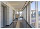 Bright hallway with modern flooring and large windows offering city views at 2201 N Central Ave # 4E, Phoenix, AZ 85004