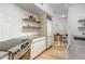 Modern kitchen with stainless steel appliances and white cabinetry at 2201 N Central Ave # 4E, Phoenix, AZ 85004