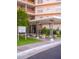 Phoenix Towers entrance with covered walkway and landscaping at 2201 N Central Ave # 4E, Phoenix, AZ 85004