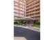 Mid-century modern building exterior with covered entryway and landscaping at 2201 N Central Ave # 4E, Phoenix, AZ 85004
