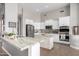 Modern kitchen with white cabinets and granite countertops at 2308 E Dry Wood Rd, Phoenix, AZ 85024