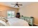 Bedroom with king-size bed and ceiling fan at 5450 E Deer Valley Dr # 1209, Phoenix, AZ 85054