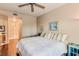 Bedroom with king-size bed and ceiling fan at 5450 E Deer Valley Dr # 1209, Phoenix, AZ 85054