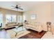 Living room with hardwood floors, neutral walls, and ample natural light at 5450 E Deer Valley Dr # 1209, Phoenix, AZ 85054