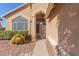 Front entryway with a decorative iron gate and well-manicured landscaping at 4356 E Rancho Tierra Dr, Cave Creek, AZ 85331