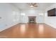 Living room with fireplace, tile floors, and large windows at 4356 E Rancho Tierra Dr, Cave Creek, AZ 85331