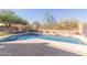 Relaxing swimming pool with a large concrete patio at 4356 E Rancho Tierra Dr, Cave Creek, AZ 85331