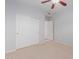Bedroom with double door closet and carpet flooring at 4356 E Rancho Tierra Dr, Cave Creek, AZ 85331