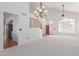 Spacious living area with high ceilings, chandelier, and hardwood floors at 4356 E Rancho Tierra Dr, Cave Creek, AZ 85331