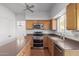 Galley style kitchen with stainless steel appliances at 4356 E Rancho Tierra Dr, Cave Creek, AZ 85331