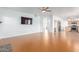 Bright living room with hardwood floors and a view into the kitchen at 4356 E Rancho Tierra Dr, Cave Creek, AZ 85331