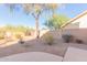 Landscaped backyard with desert plants and gravel at 4356 E Rancho Tierra Dr, Cave Creek, AZ 85331