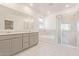 Modern bathroom boasts double vanity, soaking tub, and walk-in shower at 7400 E White Tail Rd, San Tan Valley, AZ 85143