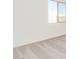 Bright bedroom with neutral wall and carpet, featuring a large window at 7400 E White Tail Rd, San Tan Valley, AZ 85143