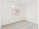 Well-lit bedroom, carpeted, with a window providing natural light at 7400 E White Tail Rd, San Tan Valley, AZ 85143