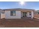 House exterior view showing backyard, patio and stucco siding at 7400 E White Tail Rd, San Tan Valley, AZ 85143