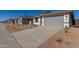 New home in a residential neighborhood, featuring a gray garage door at 7400 E White Tail Rd, San Tan Valley, AZ 85143