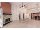Living area with tile floors, fireplace, and open floor plan at 5505 E Mclellan Rd # 9, Mesa, AZ 85205
