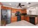 L shaped kitchen with wood cabinets and granite countertops at 5505 E Mclellan Rd # 9, Mesa, AZ 85205