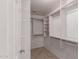 Large walk-in closet with shelves and hanging rods at 5505 E Mclellan Rd # 9, Mesa, AZ 85205