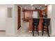 Kitchen with wood cabinets, granite counters, and stainless steel appliances at 5505 E Mclellan Rd # 9, Mesa, AZ 85205