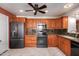 Bright kitchen, granite counters, stainless steel appliances, and wood cabinets at 5505 E Mclellan Rd # 9, Mesa, AZ 85205