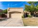 Tan colored house with a two car garage at 5505 E Mclellan Rd # 9, Mesa, AZ 85205