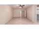 Bright bedroom with tile floors and ceiling fan at 5505 E Mclellan Rd # 9, Mesa, AZ 85205