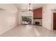 Bright living room with tile floors, fireplace and sliding glass doors at 5505 E Mclellan Rd # 9, Mesa, AZ 85205