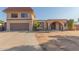 Two-story home with a large driveway and attached garage at 2451 E Glencove St, Mesa, AZ 85213