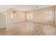 Bright dining room with wood-look tile floors and a chandelier at 665 W Gabrilla Ct, Casa Grande, AZ 85122