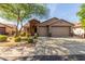 Two-story house with two-car garage and well-manicured landscaping at 2581 W Shackleton Dr, Anthem, AZ 85086