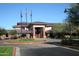 Community center with circular driveway and American flags at 2581 W Shackleton Dr, Anthem, AZ 85086