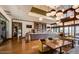Upscale community bar with a wine cellar and seating area at 17543 E Silver Sage Ln, Rio Verde, AZ 85263