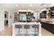 Modern kitchen with stainless steel appliances and large island at 17543 E Silver Sage Ln, Rio Verde, AZ 85263