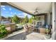 Relaxing backyard patio with fireplace and seating area at 17543 E Silver Sage Ln, Rio Verde, AZ 85263