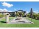 Landscaped backyard with fire pit and artificial turf at 17543 E Silver Sage Ln, Rio Verde, AZ 85263