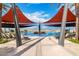 Resort-style pool with shade structures and lounge chairs at 17543 E Silver Sage Ln, Rio Verde, AZ 85263