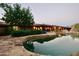 Stunning kidney shaped pool with flagstone decking at 5123 E Mcdonald Dr, Paradise Valley, AZ 85253