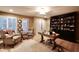 Spacious home office with hardwood floors and ample natural light at 5123 E Mcdonald Dr, Paradise Valley, AZ 85253