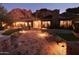 Beautiful home exterior with a stone pathway and desert landscaping at 5123 E Mcdonald Dr, Paradise Valley, AZ 85253