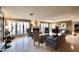 Spacious living room with fireplace, large windows, and comfortable seating at 5123 E Mcdonald Dr, Paradise Valley, AZ 85253