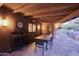 Covered patio with dining furniture and mountain views at 5123 E Mcdonald Dr, Paradise Valley, AZ 85253