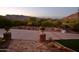 Landscaped front yard with mountain views and stone pathway at 5123 E Mcdonald Dr, Paradise Valley, AZ 85253