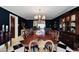 Spacious dining room with wood floors and large windows at 5123 E Mcdonald Dr, Paradise Valley, AZ 85253