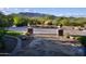 Landscaped yard with stone pathway leading to the home entrance at 5123 E Mcdonald Dr, Paradise Valley, AZ 85253