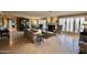 Bright living room featuring a fireplace and ample natural light at 5123 E Mcdonald Dr, Paradise Valley, AZ 85253