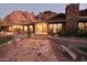 Stunning desert home with stone accents and a welcoming entrance at 5123 E Mcdonald Dr, Paradise Valley, AZ 85253